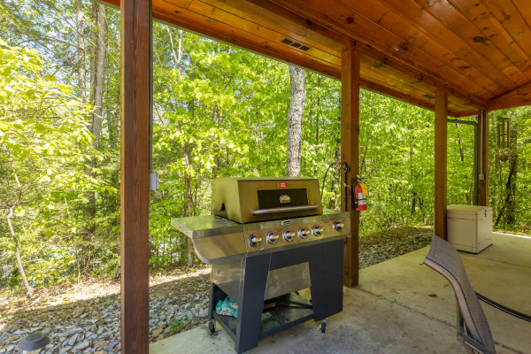 Grill in a pavilion at Smokies Paradise Lodge, a 5 bedroom cabin rental located in Pigeon Forge