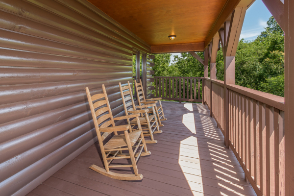 Deck with rocking chairs at Moose Lodge, a 4 bedroom cabin rental located in Sevierville