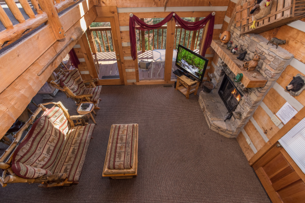 Looking down at the living room at Mountain Glory, a 1 bedroom cabin rental located in Pigeon Forge