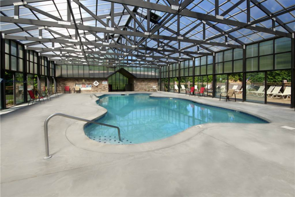 Indoor pool for guest use at Kick Back & Relax! A 4 bedroom cabin rental located in Pigeon Forge