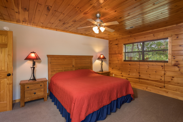 Bedroom with night stands and lamps at Endless View, a 4 bedroom cabin rental located in Pigeon Forge