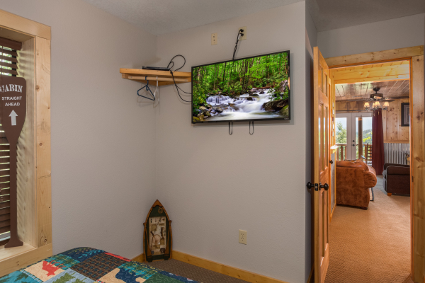 TV in a bedroom at Endless View, a 4 bedroom cabin rental located in Pigeon Forge