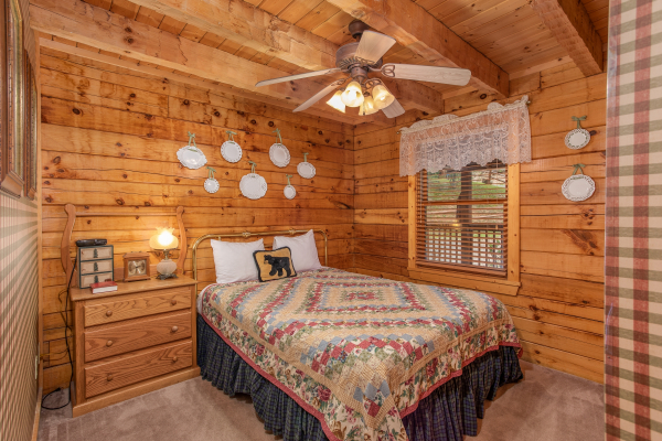Bedroom with a dresser at Cabin in the Clouds, a 3-bedroom cabin rental located in Pigeon Forge