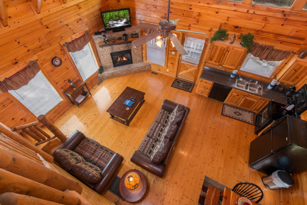 Looking down on the living room at A Beautiful Memory, a 4 bedroom cabin rental located in Pigeon Forge