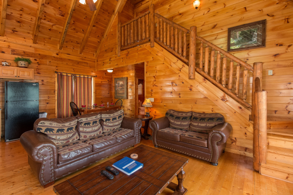 Sofa and loveseat in the living room at A Beautiful Memory, a 4 bedroom cabin rental located in Pigeon Forge