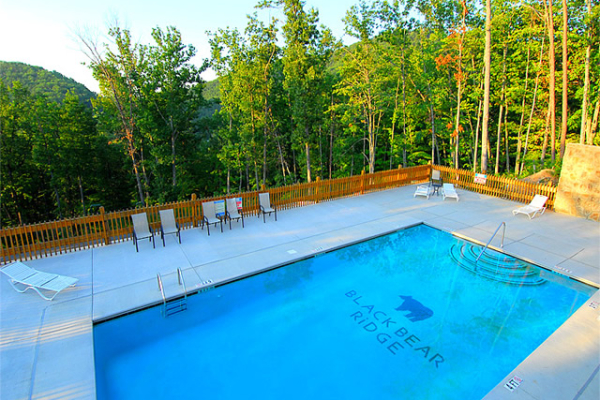 Resort pool for guests at The Sugar Shack, a 2 bedroom cabin rental located in Pigeon Forge