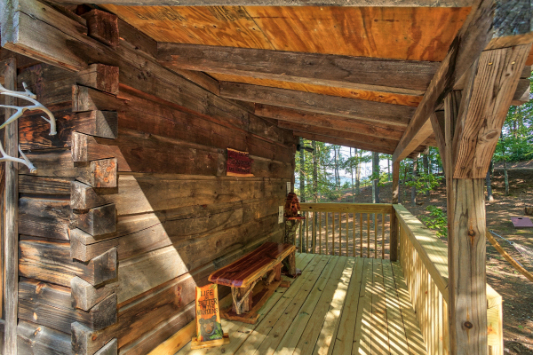 Small covered porch at bearfoot adventure a 2 bedroom cabin rental located in gatlinburg