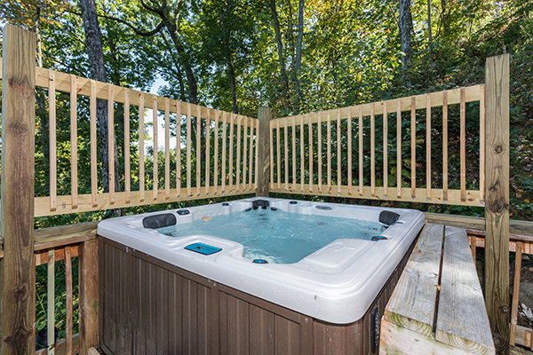 Hot tub on a deck at Soaring Heights, a 3 bedroom cabin rental located in Gatlinburg