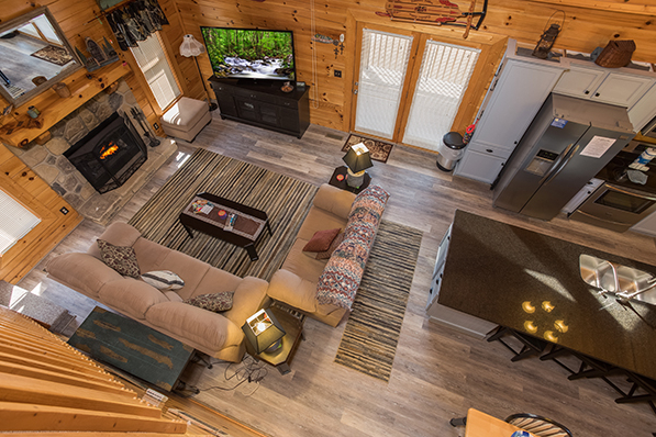 Looking down into the main floor at Lake Life, a 4 bedroom cabin rental located in Sevierville
