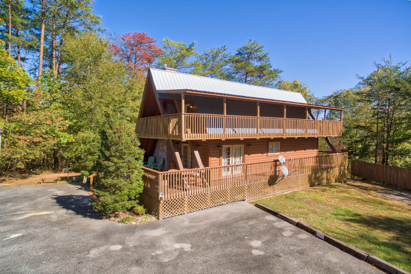 Rear exterior of the cabin and parking at Living on Love, a 2 bedroom cabin rental located in Pigeon Forge