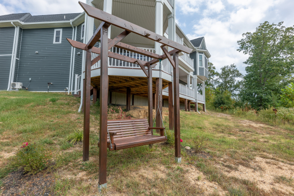 Swing in the yard at Summit Glory, a 5 bedroom cabin rental located in Pigeon Forge