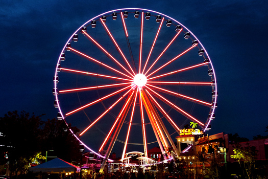 the island ferris wheel at night near a bear on the ridge a 2 bedroom cabin rental located in pigeon forge