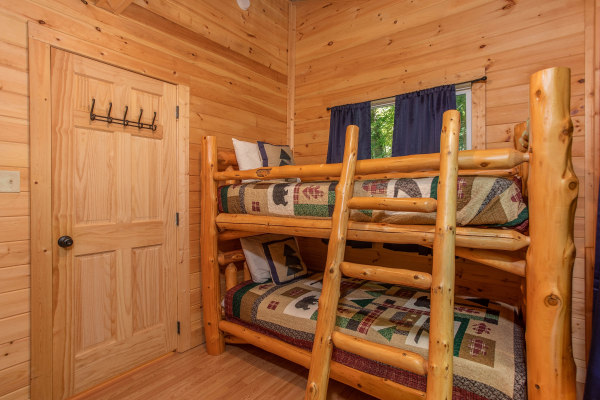 Two sets of twin bunks in a bedroom at License to Chill, a 3 bedroom cabin rental located in Gatlinburg