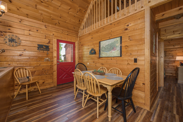 Dining table for 6 at Eagle's Bluff, a 2 bedroom cabin rental located in Douglas lake