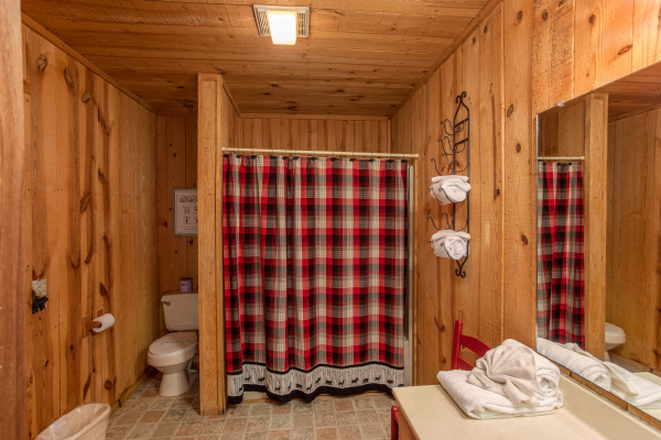 Bathroom with a tub and shower at Peace & Quiet, a 3 bedroom cabin rental located in Pigeon Forge