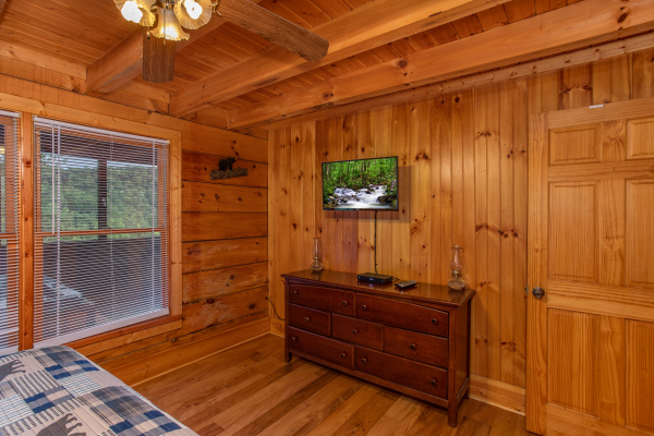 Dresser and TV at Wonders in the Sky, a 3 bedroom cabin rental located in Gatlinburg