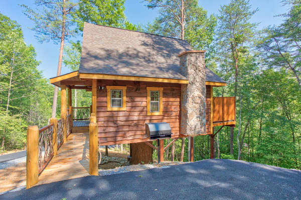 Level park and cabin exterior at Out on a Limb, a 1 bedroom cabin rental located in Gatlinburg