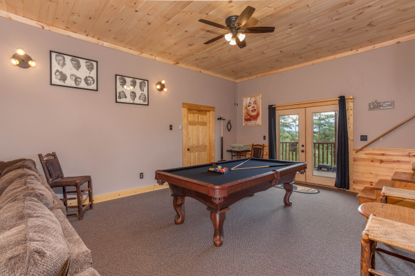 Pool table in the game room at I Do Love Views, a 3 bedroom cabin rental located in Pigeon Forge