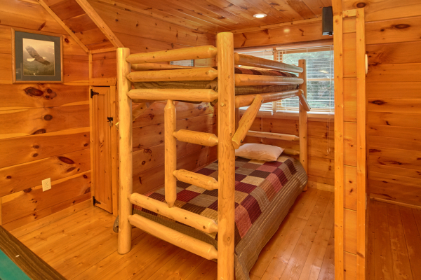 Twin bunks at Pop's Snuggle Bear, a 1 bedroom cabin rental located in Pigeon Forge