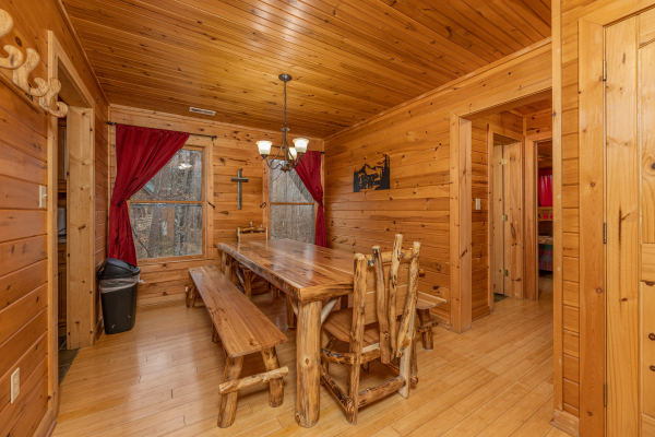 Dining room with seating for 8 at Cabin Life, a 2 bedroom cabin rental located in Pigeon Forge