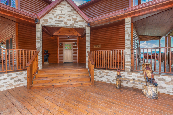 Entry porch at Four Seasons Palace, a 5-bedroom cabin rental located in Pigeon Forge