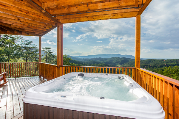 Hot tub overlooking the mountains at Four Seasons Palace, a 5-bedroom cabin rental located in Pigeon Forge