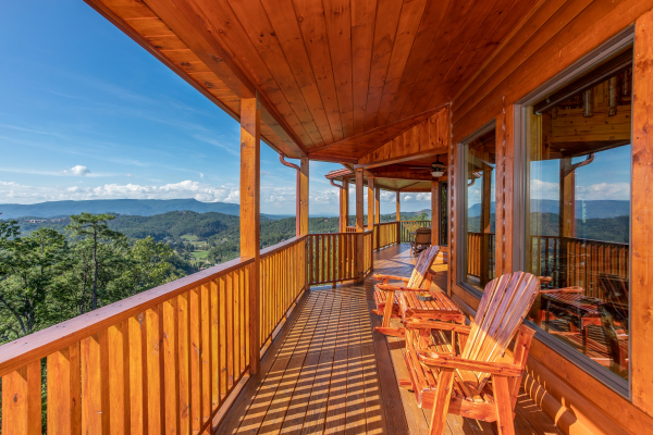 Plenty of deck seating at Four Seasons Palace, a 5-bedroom cabin rental located in Pigeon Forge