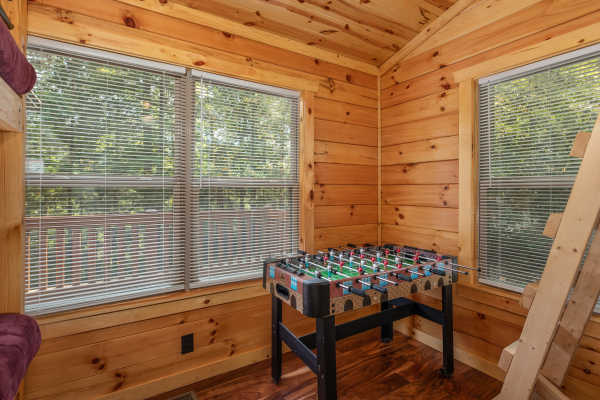 Foosball table at Paws on the Porch, a 2 bedroom cabin rental located in Gatlinburg