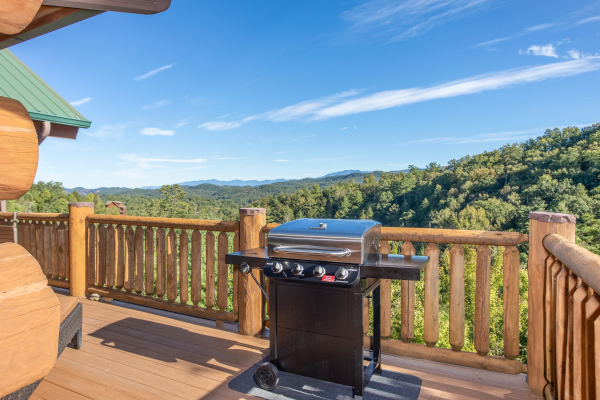 Propane grill on a deck overlooking the Smoky Mountains at Great View Lodge, a 5-bedroom cabin rental located in Pigeon Forge