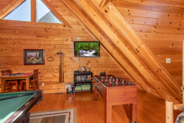 Foosball table in the game loft at Bears Eye View, a 2-bedroom cabin rental located in Pigeon Forge