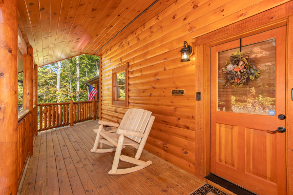 Front porch with rocking chair at Panorama, a 2 bedroom cabin rental located in Pigeon Forge