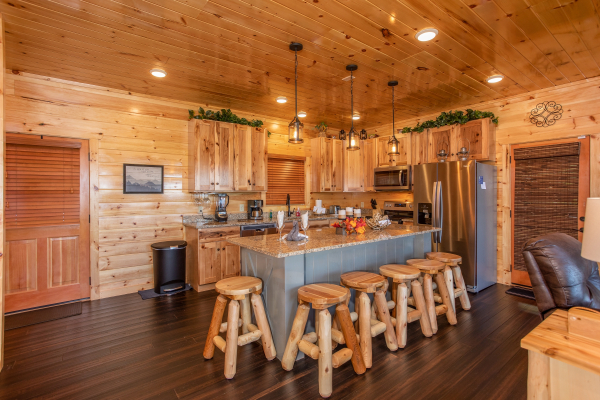 Kitchen with island seating for six at Panorama, a 2 bedroom cabin rental located in Pigeon Forge