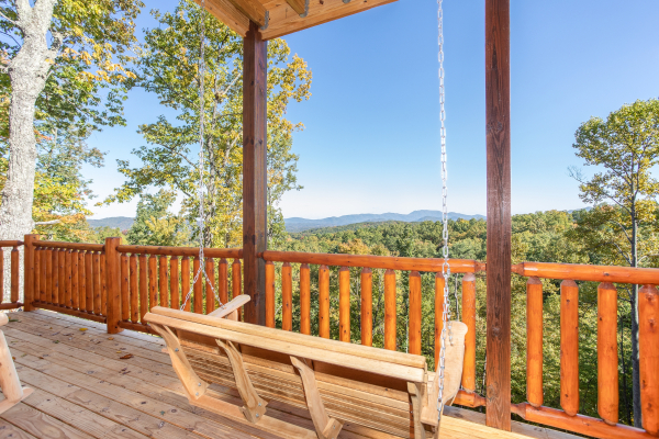 Porch swing facing the mountain view at Panorama, a 2 bedroom cabin rental located in Pigeon Forge