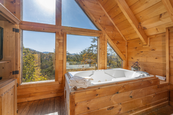 Jacuzzi in the loft with views at American Beauty, a 2 bedroom cabin rental located in Pigeon Forge