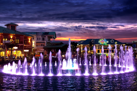 the island fountain at night near american beauty a 2 bedroom cabin rental located in pigeon forge