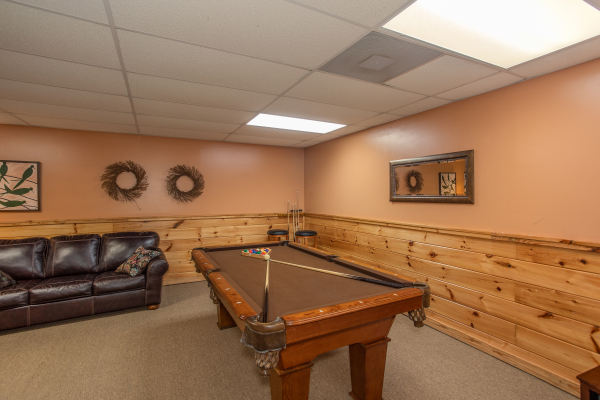 Pool table in the game room at Granny D's, a 2 bedroom cabin rental located in Pigeon Forge