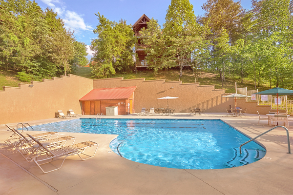 Outdoor pool access for guests at Granny D's, a 2 bedroom cabin rental located in Pigeon Forge