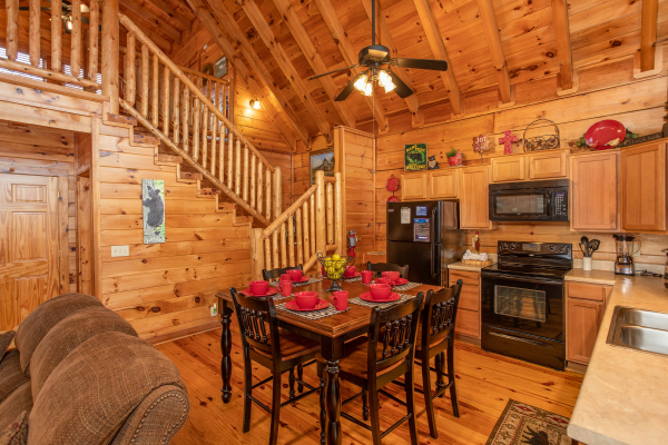 Dining space for six in the kitchen at Granny D's, a 2 bedroom cabin rental located in Pigeon Forge