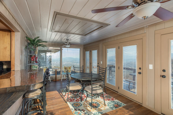 Dining space just off the kitchen at Best View Ever! A 5 bedroom cabin rental in Pigeon Forge