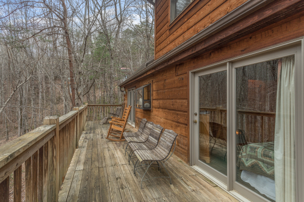 Deck seating at Sweet Mountain Escape, a 2 bedroom cabin rental located in Pigeon Forge