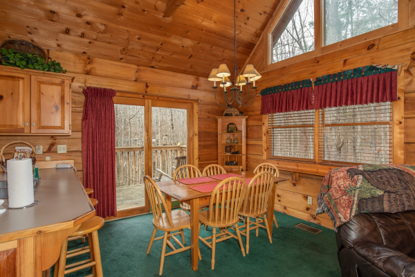 Dining table for six at Sweet Mountain Escape, a 2 bedroom cabin rental located in Pigeon Forge