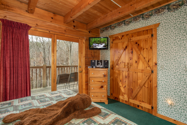 Dresser and TV at Sweet Mountain Escape, a 2 bedroom cabin rental located in Pigeon Forge