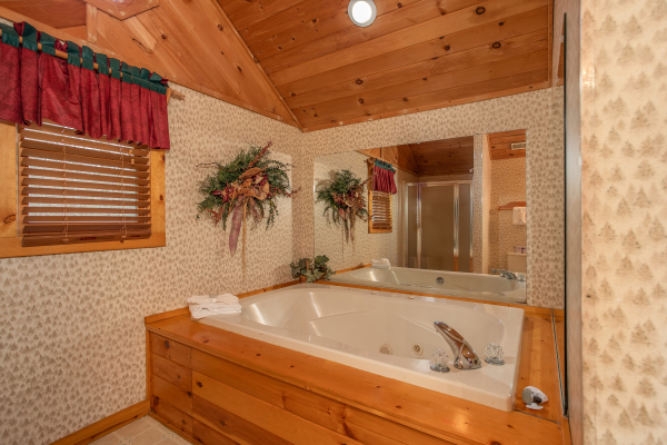Jacuzzi off the upstairs bedroom at Sweet Mountain Escape, a 2 bedroom cabin rental located in Pigeon Forge