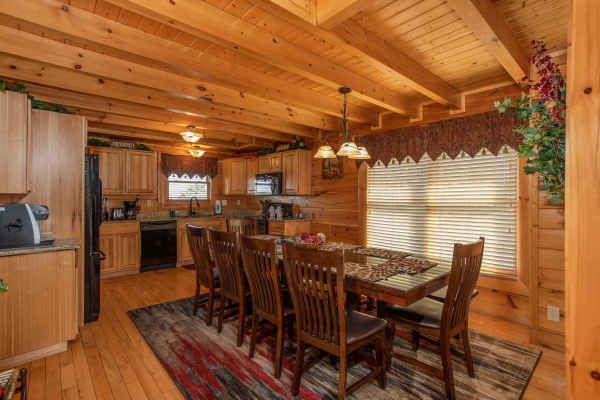 Dining space for ten at Better View, a 4 bedroom cabin rental located in Pigeon Forge