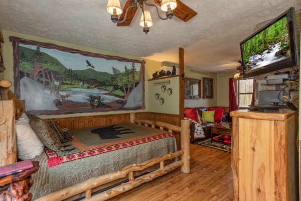 Bedroom space at Bear Mountain Hollow, a 1 bedroom cabin rental located in Pigeon Forge