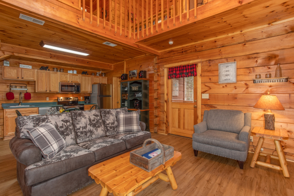 Living room at The Nest, a 1 bedroom cabin rental located in pigeon forge