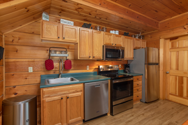 Kitchen at The Nest, a 1 bedroom cabin rental located in pigeon forge