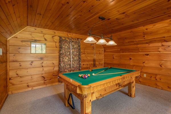 Pool table in the loft at Hillside Haven, a 1 bedroom cabin rental located in Pigeon Forge