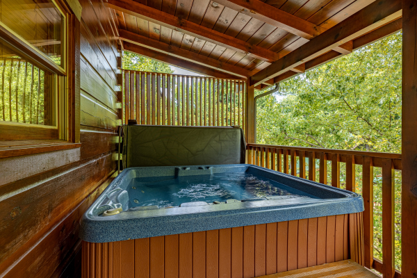 Hot tub at Livin' Simple, a 2 bedroom cabin rental located in Pigeon Forge