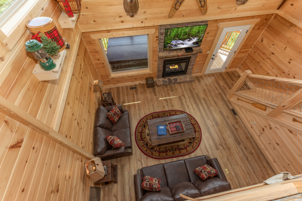 Looking down on the living room at Sawmill Springs, a 3 bedroom rental cabin in Pigeon Forge